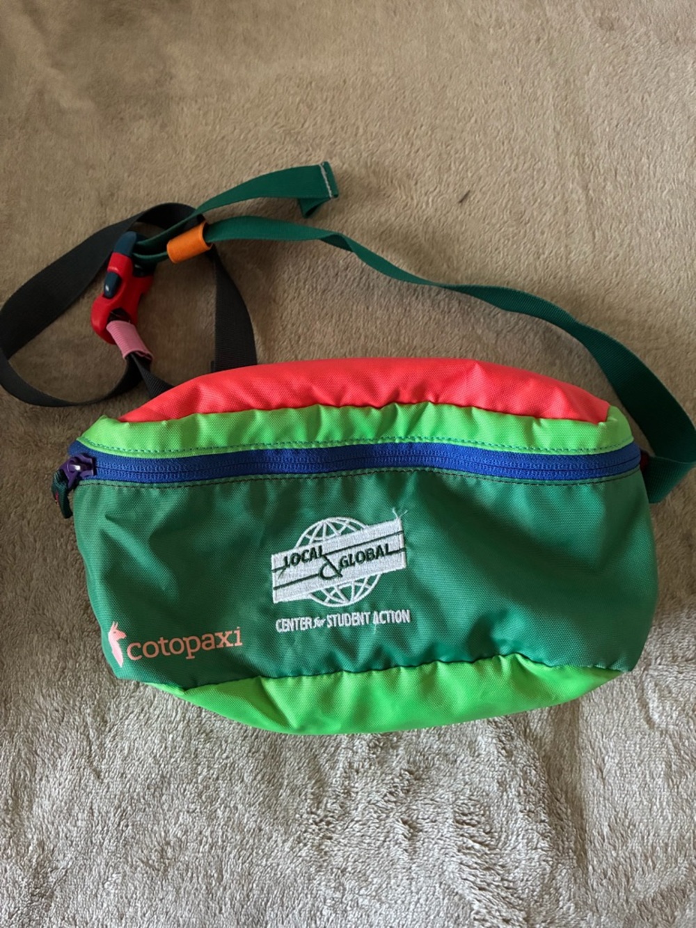 Cotopaxi Green Red Neon Green Blue fanny pack
